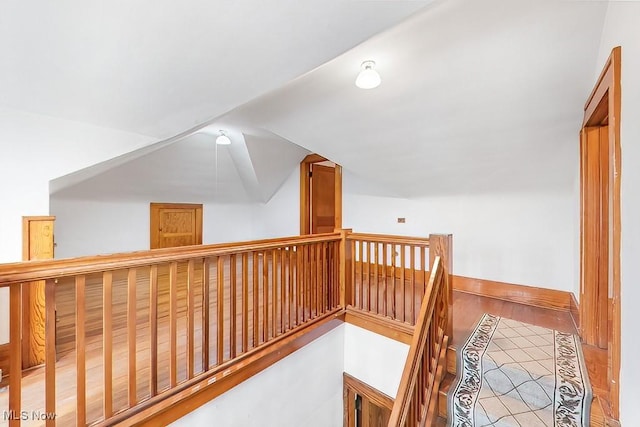 245 Merriman Rd, Akron, OH 44303 - corridor featuring lofted ceiling and an upstairs landing