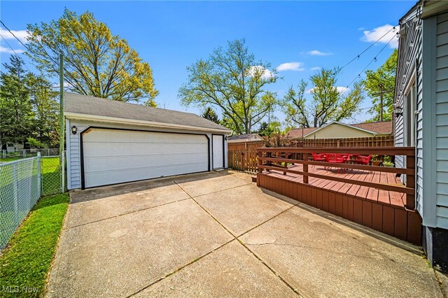 detached garage with fence