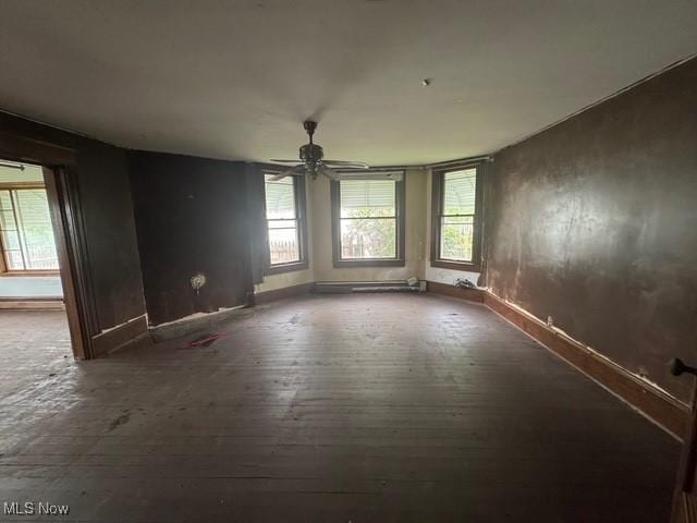 234 High Ave, Byesville, OH 43723 - empty room with a ceiling fan, baseboards, and wood finished floors