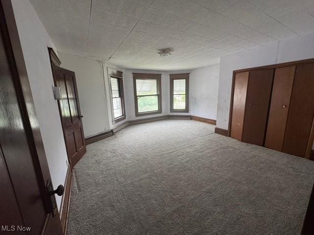 234 High Ave, Byesville, OH 43723 - unfurnished bedroom featuring carpet flooring and baseboards