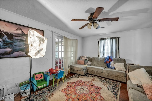 132 Irondale St, Elyria, OH 44035 - living area featuring healthy amount of natural light, a ceiling fan, and wood finished floors