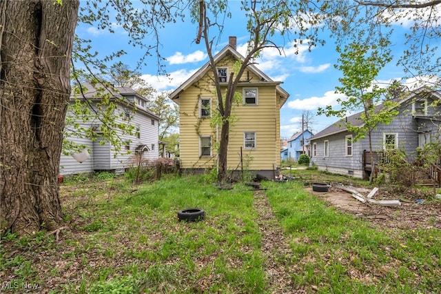 132 Irondale St, Elyria, OH 44035 - back of property with a chimney
