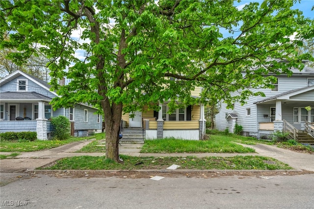 132 Irondale St, Elyria, OH 44035 - view of front facade with a porch