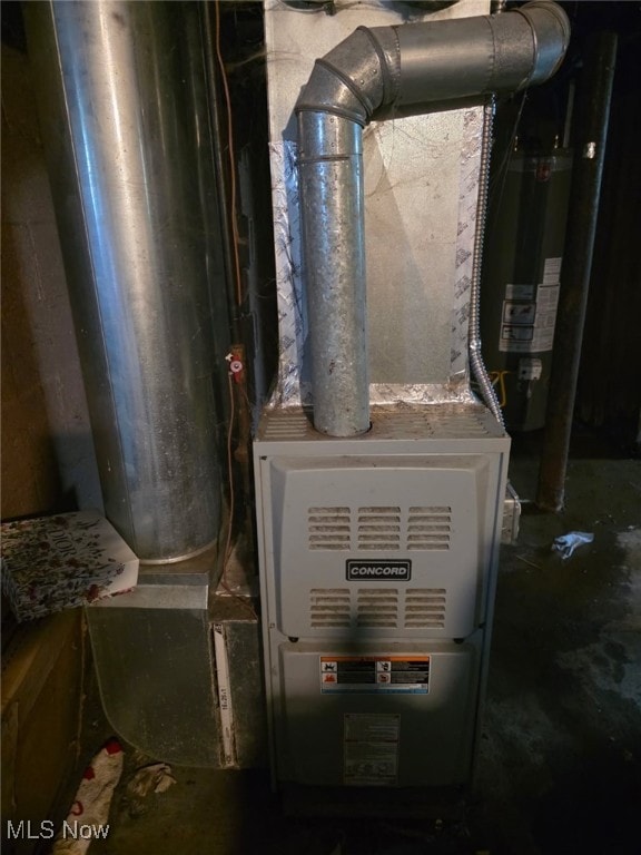 132 Irondale St, Elyria, OH 44035 - utility room with water heater and heating unit