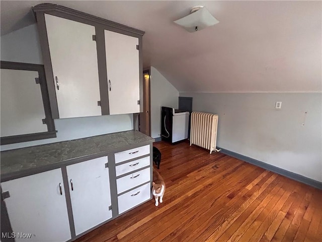 553 Willard Ave SE, Warren, OH 44483 - bonus room with radiator, vaulted ceiling, and hardwood / wood-style flooring