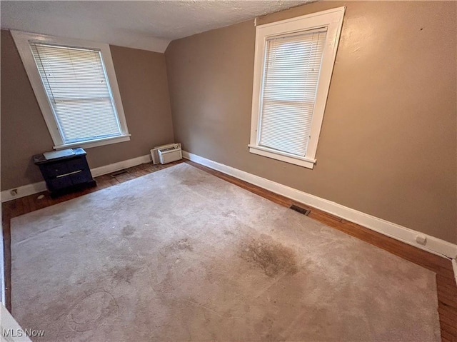 553 Willard Ave SE, Warren, OH 44483 - unfurnished room featuring wood finished floors and baseboards