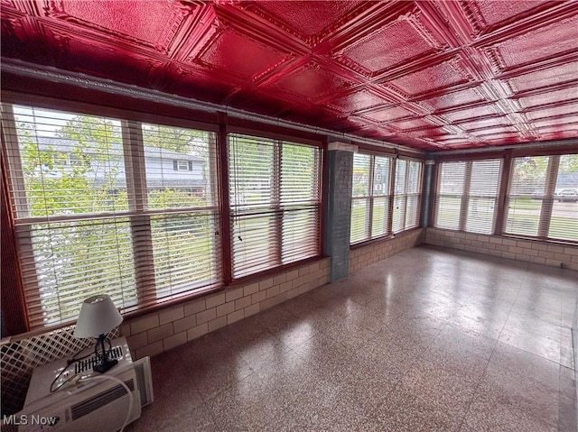 553 Willard Ave SE, Warren, OH 44483 - unfurnished sunroom with an ornate ceiling