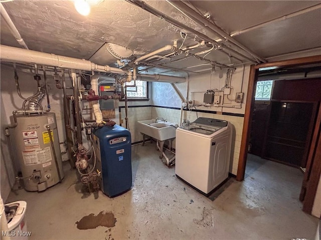 553 Willard Ave SE, Warren, OH 44483 - basement with washer / dryer, water heater, and a heating unit