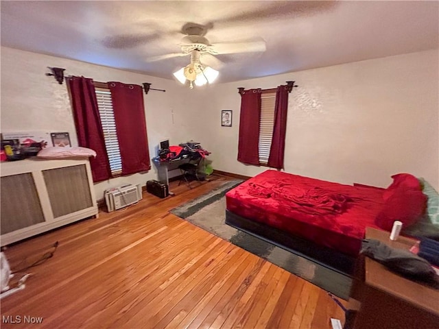 553 Willard Ave SE, Warren, OH 44483 - bedroom featuring wood-type flooring and a ceiling fan