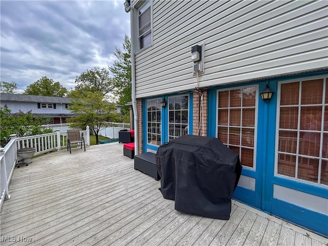 553 Willard Ave SE, Warren, OH 44483 - wooden deck featuring a grill and french doors