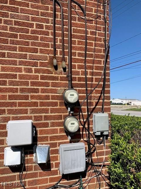 30810 Euclid Ave, Wickliffe, OH 44092 - exterior view of brick siding and electric meter