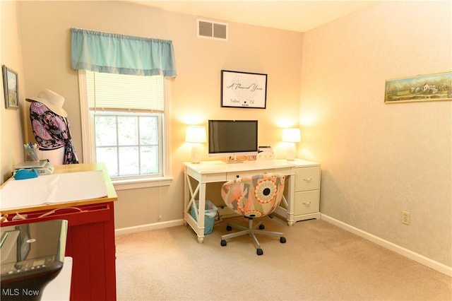 carpeted office with baseboards