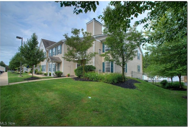 view of front of property featuring a chimney