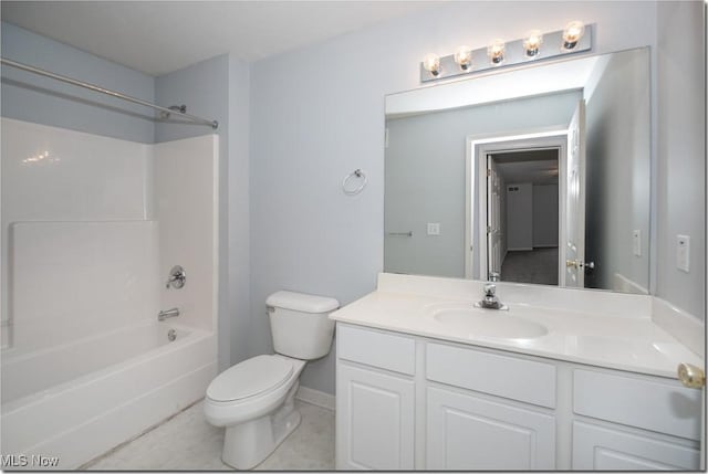 full bath with toilet, shower / tub combination, vanity, tile patterned floors, and baseboards