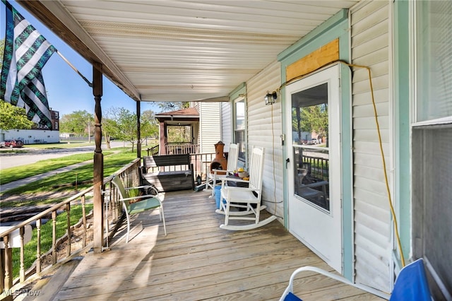 1821 E 30th St, Lorain, OH 44055 - wooden terrace with a porch