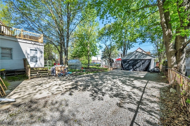 1821 E 30th St, Lorain, OH 44055 - view of yard featuring fence and an outbuilding