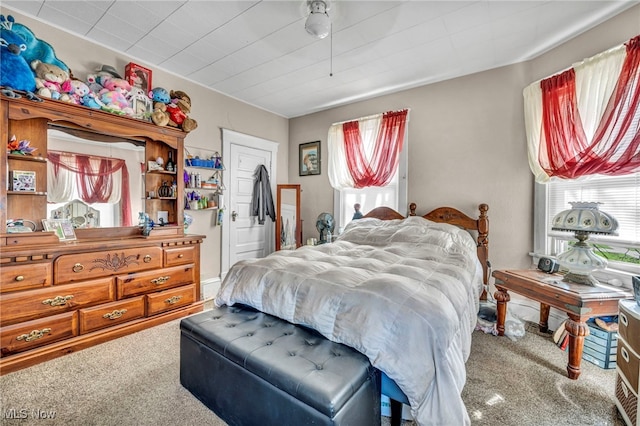 1821 E 30th St, Lorain, OH 44055 - carpeted bedroom with ceiling fan