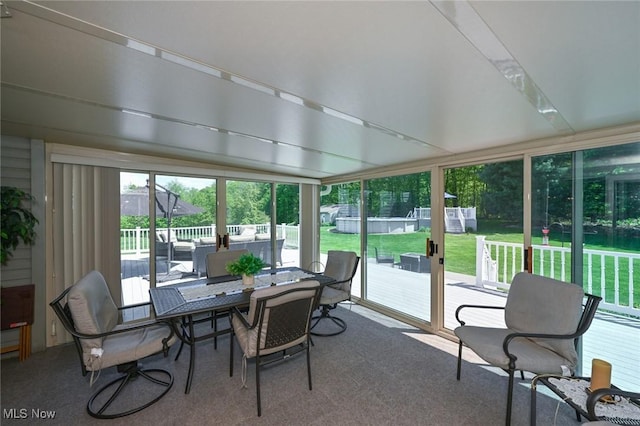 1152 Terraho Dr, Salem, OH 44460 - sunroom featuring outdoor dining space, carpet floors, and an outdoor hangout area