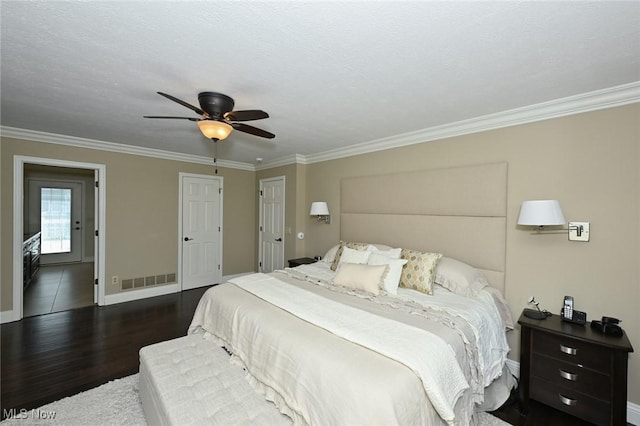 1152 Terraho Dr, Salem, OH 44460 - bedroom featuring wood finished floors, crown molding, baseboards, and ceiling fan