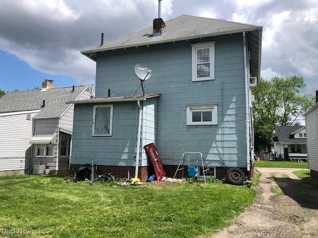 2117 Maple Ave NE, Canton, OH 44714 - back of property with a chimney