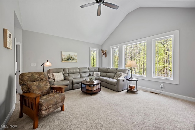 15020 Steelhead Run, Chardon, OH 44024 - carpeted living room featuring ceiling fan, healthy amount of natural light, baseboards, and high vaulted ceiling