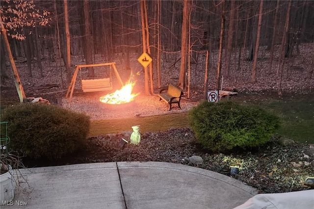 15020 Steelhead Run, Chardon, OH 44024 - view of yard featuring a fire pit