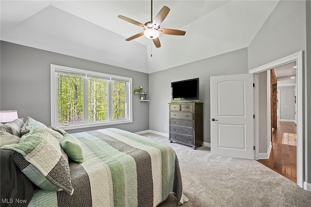 15020 Steelhead Run, Chardon, OH 44024 - carpeted bedroom with baseboards, high vaulted ceiling, and a ceiling fan