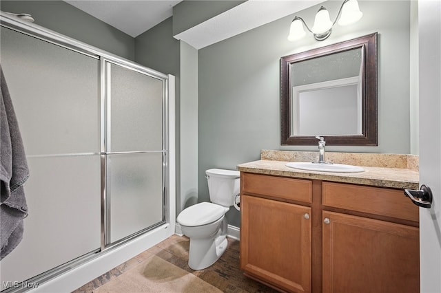 15020 Steelhead Run, Chardon, OH 44024 - full bath featuring a stall shower, toilet, wood finished floors, and vanity