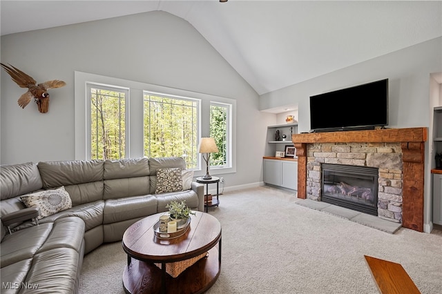 15020 Steelhead Run, Chardon, OH 44024 - living area featuring light colored carpet, a fireplace, baseboards, built in shelves, and high vaulted ceiling