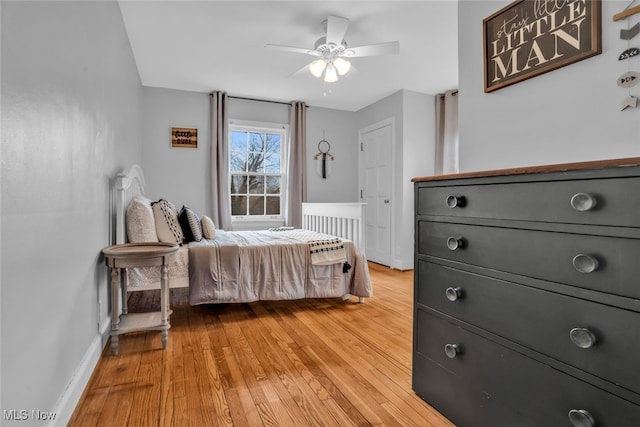 555 E Milton St, Alliance, OH 44601 - bedroom with baseboards, light wood-style flooring, and ceiling fan