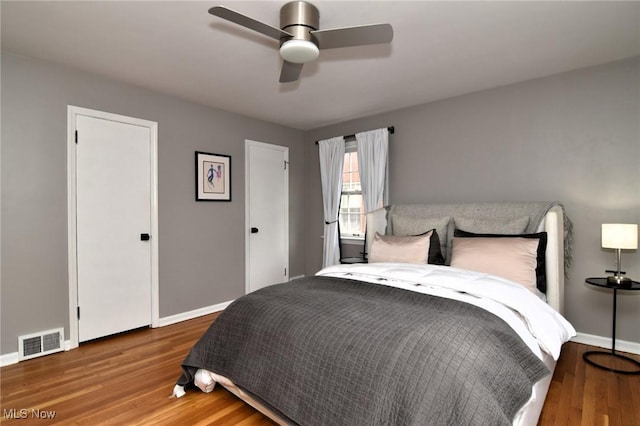 3622 Lynnfield Rd, Shaker Heights, OH 44122 - bedroom featuring baseboards, wood finished floors, and a ceiling fan