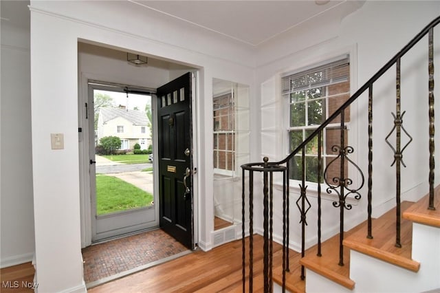 3622 Lynnfield Rd, Shaker Heights, OH 44122 - foyer entrance featuring stairs, baseboards, and wood finished floors