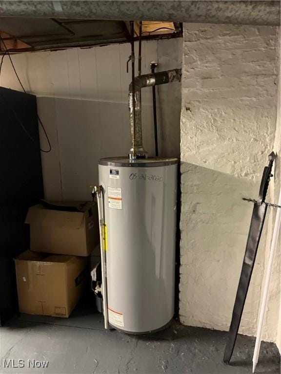 utility room with water heater