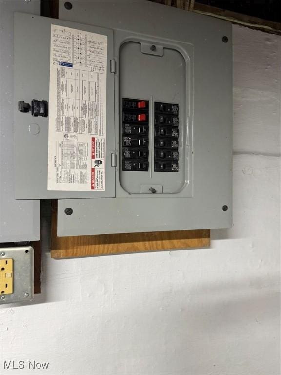 utility room featuring electric panel