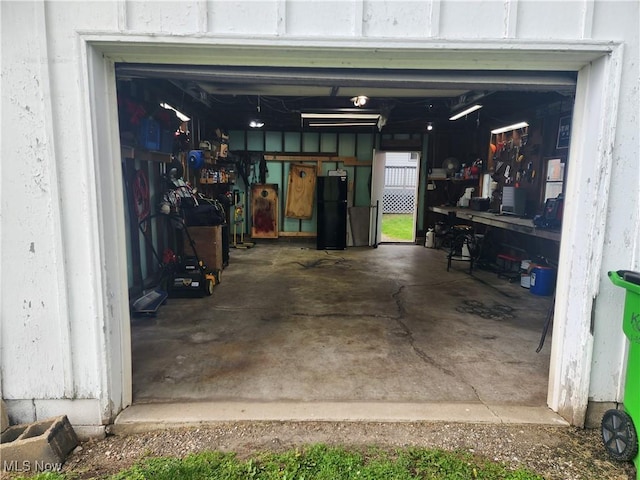 1327 Orange St, Coshocton, OH 43812 - garage with freestanding refrigerator