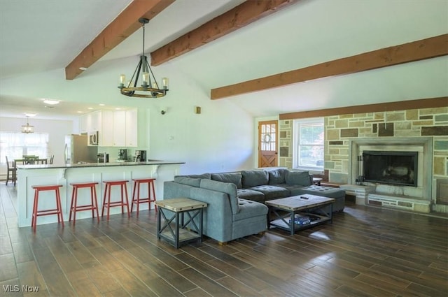 31 Garden Park Dr, Chagrin Falls, OH 44022 - living room with a chandelier, dark wood-style floors, and healthy amount of natural light