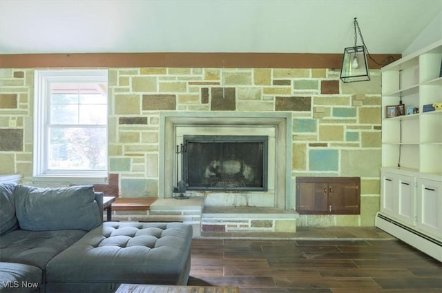 31 Garden Park Dr, Chagrin Falls, OH 44022 - detailed view of a baseboard radiator, a fireplace, and wood finished floors
