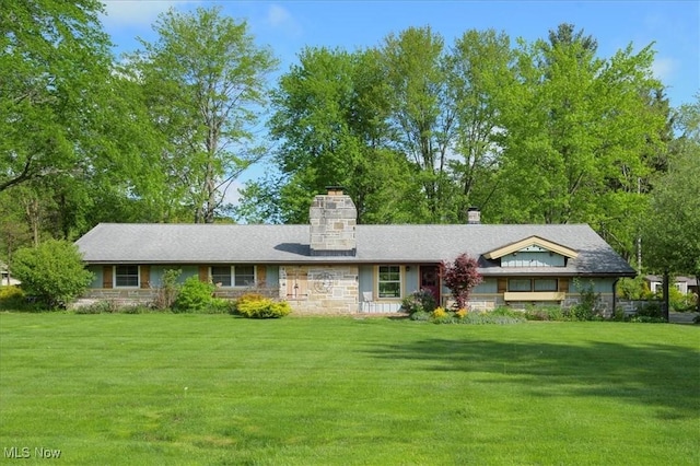 31 Garden Park Dr, Chagrin Falls, OH 44022 - ranch-style home featuring stone siding, a front yard, and a chimney