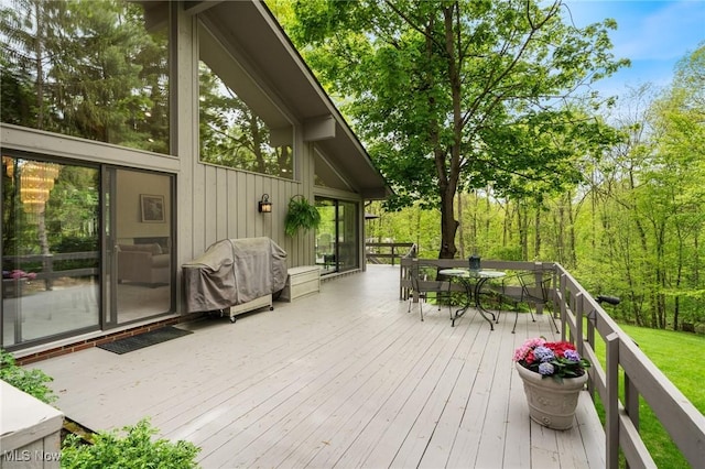 540 Bent Creek Oval, Aurora, OH 44202 - wooden deck featuring a grill and outdoor dining space