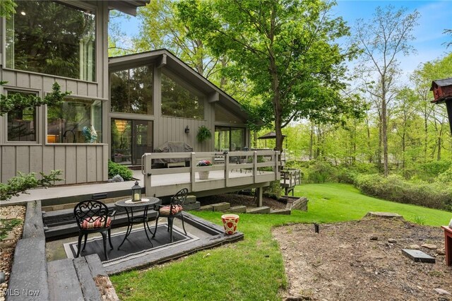 540 Bent Creek Oval, Aurora, OH 44202 - view of green lawn featuring a wooden deck
