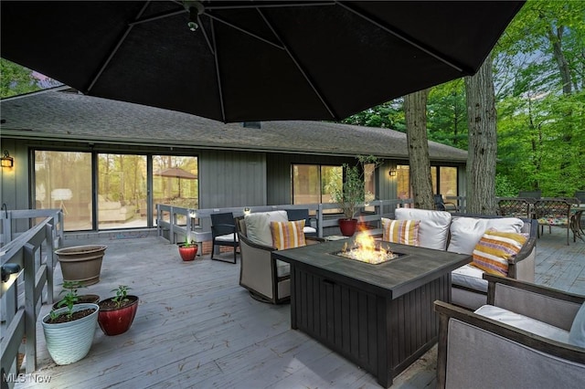 540 Bent Creek Oval, Aurora, OH 44202 - wooden deck featuring an outdoor living space with a fire pit