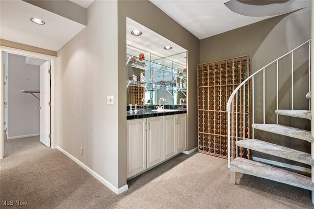 540 Bent Creek Oval, Aurora, OH 44202 - wine room featuring light colored carpet, baseboards, and recessed lighting