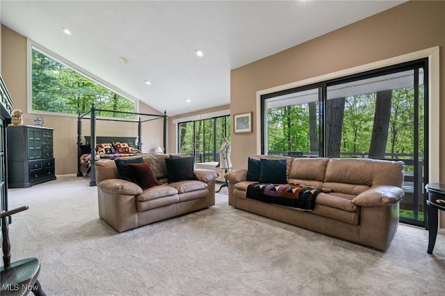 540 Bent Creek Oval, Aurora, OH 44202 - living room featuring carpet flooring, lofted ceiling, and recessed lighting