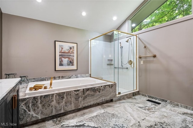 540 Bent Creek Oval, Aurora, OH 44202 - bathroom with a stall shower, marble finish flooring, recessed lighting, a garden tub, and vanity
