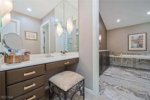 540 Bent Creek Oval, Aurora, OH 44202 - full bathroom with vanity, a bath, baseboards, and recessed lighting