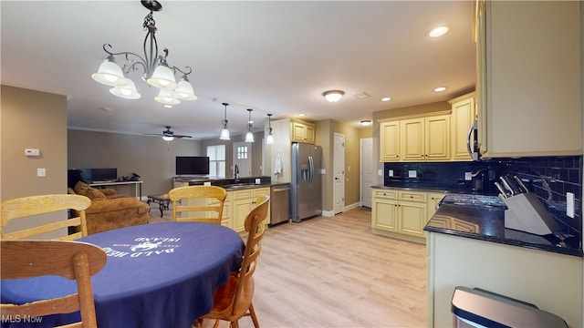 416 Elm St Unit B, Belpre, OH 45714 - dining space with ceiling fan, light wood-type flooring, a chandelier, recessed lighting, and baseboards