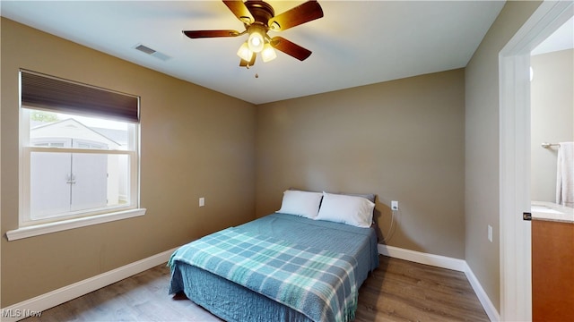 416 Elm St Unit B, Belpre, OH 45714 - bedroom featuring wood finished floors, baseboards, and a ceiling fan
