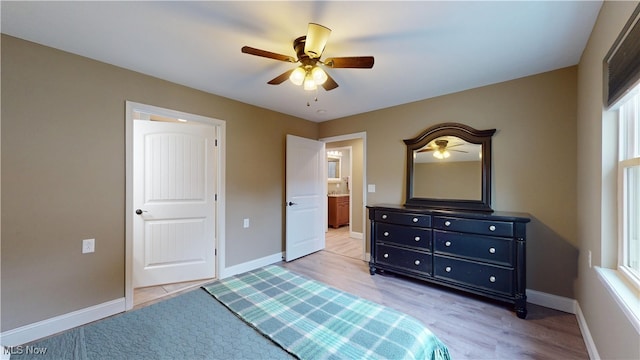 416 Elm St Unit B, Belpre, OH 45714 - bedroom featuring baseboards, light wood finished floors, and multiple windows