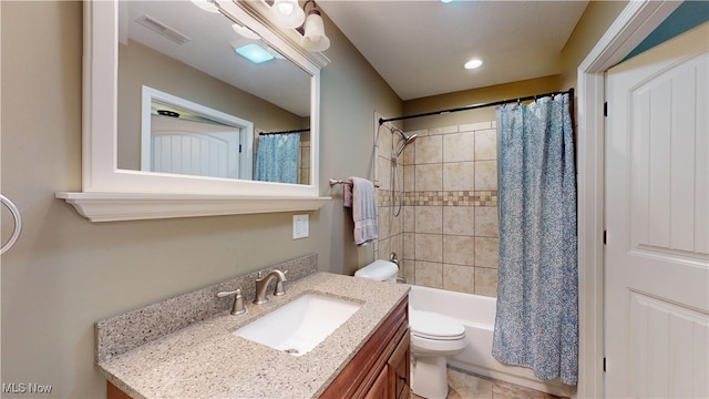 416 Elm St Unit B, Belpre, OH 45714 - full bathroom with toilet, vanity, shower / bath combo, and recessed lighting