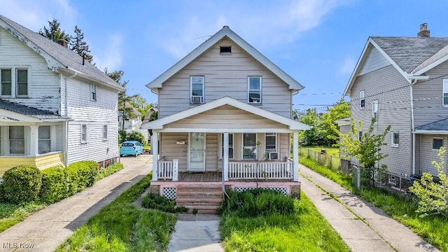 3497 W 97th St, Cleveland, OH 44102 - view of front of house with covered porch and fence